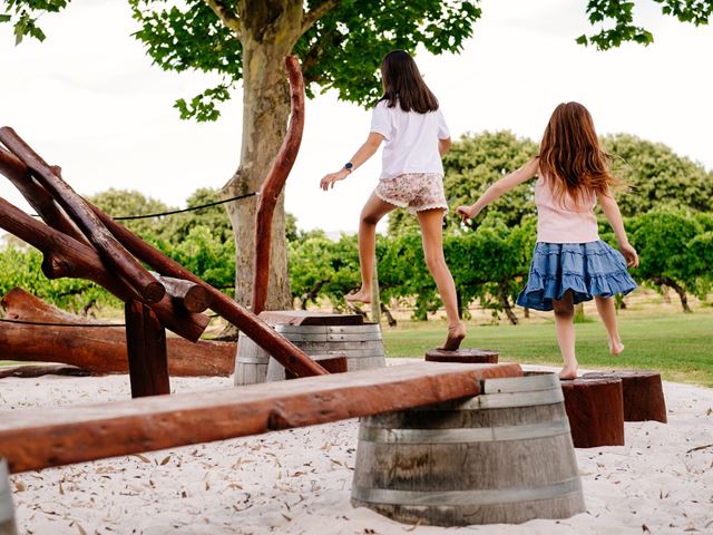 2 girls playing on the playground